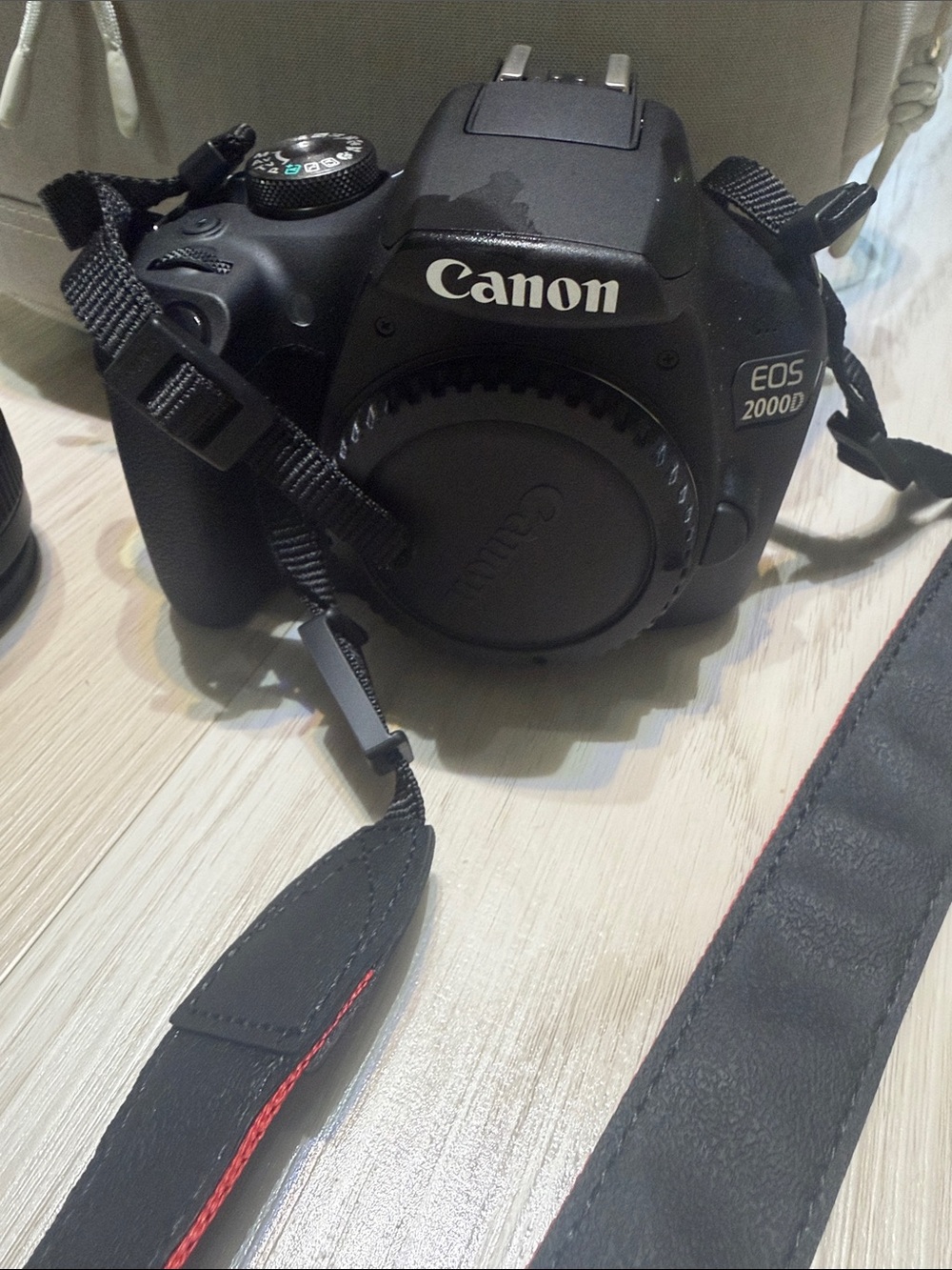 Canon Black EOS 2000D DSLR Camera Body with Neck Strap